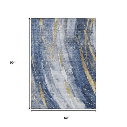 5' X 8' Blue Gold And Ivory Abstract Washable Indoor Outdoor Area Rug