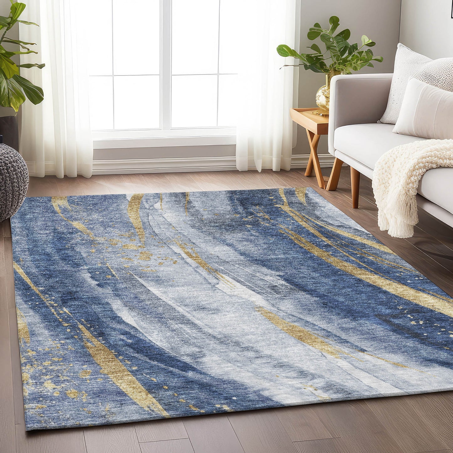 5' X 8' Blue Gold And Ivory Abstract Washable Indoor Outdoor Area Rug